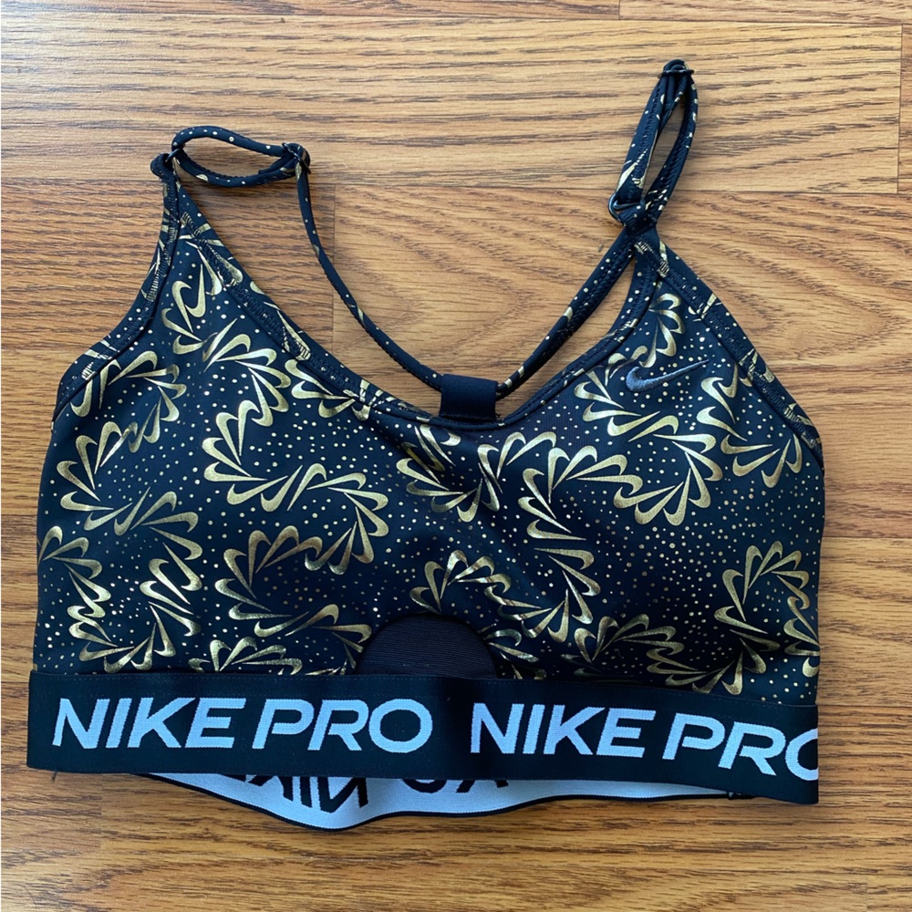 Nike black and gold sports bra